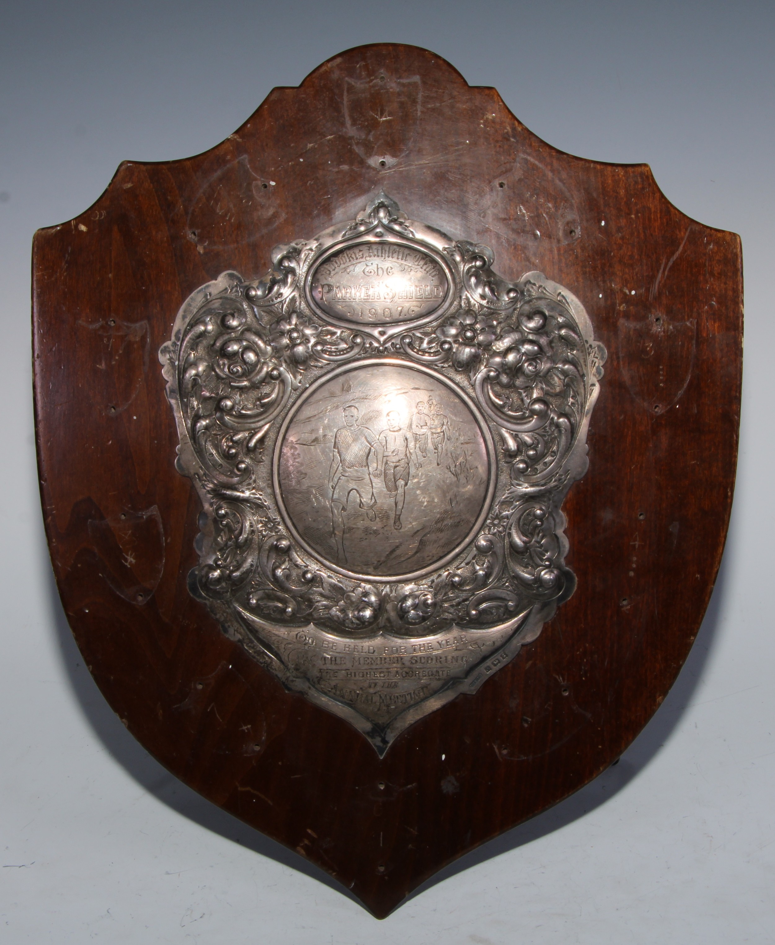 Sport - an Edwardian silver presentation trophy shield, The Parker Shield, engraved with athletes