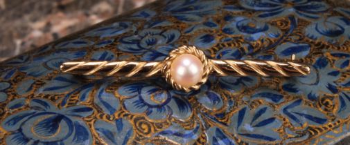 A 9ct gold and pearl tie pin, the central cultured pearl set within a rope twist circular border