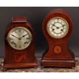 An Edwardian mahogany and marquetry balloon shaped mantel clock, 10cm circular enamel dial inscribed