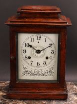 An early 20th century oak bracket or mantel alarm clock, John Bull Automatic Alarm, Patent No.