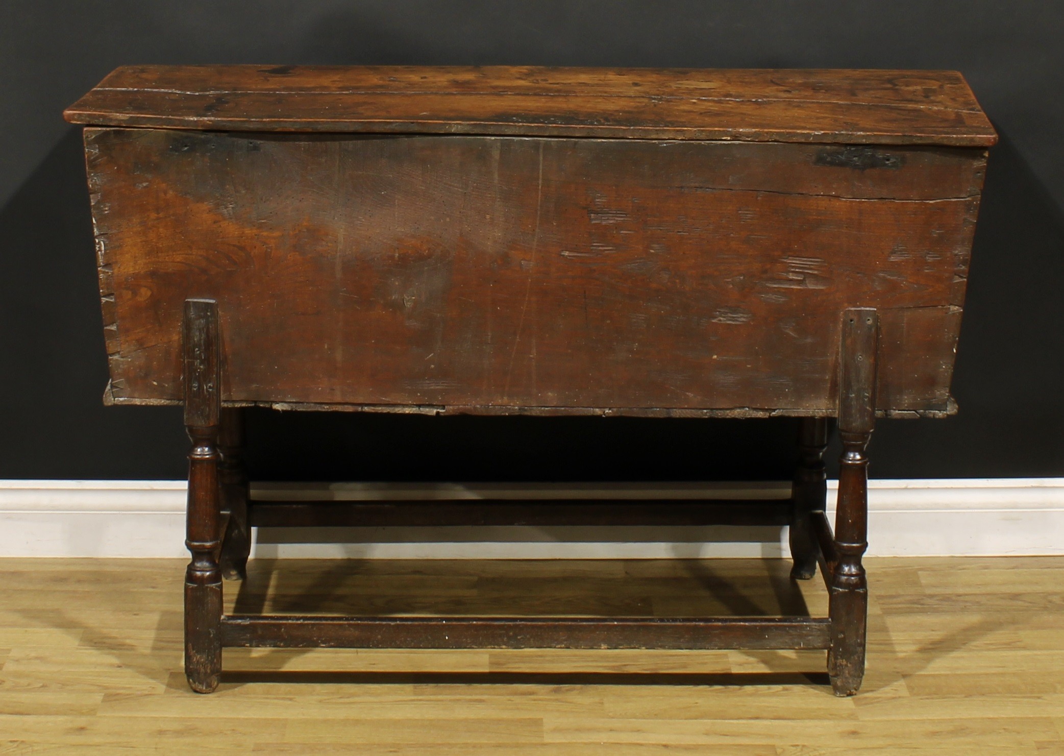 An 18th century elm dough bin, the base with turned legs, 76cm high, 121cm wide, 45cm deep - Image 5 of 5