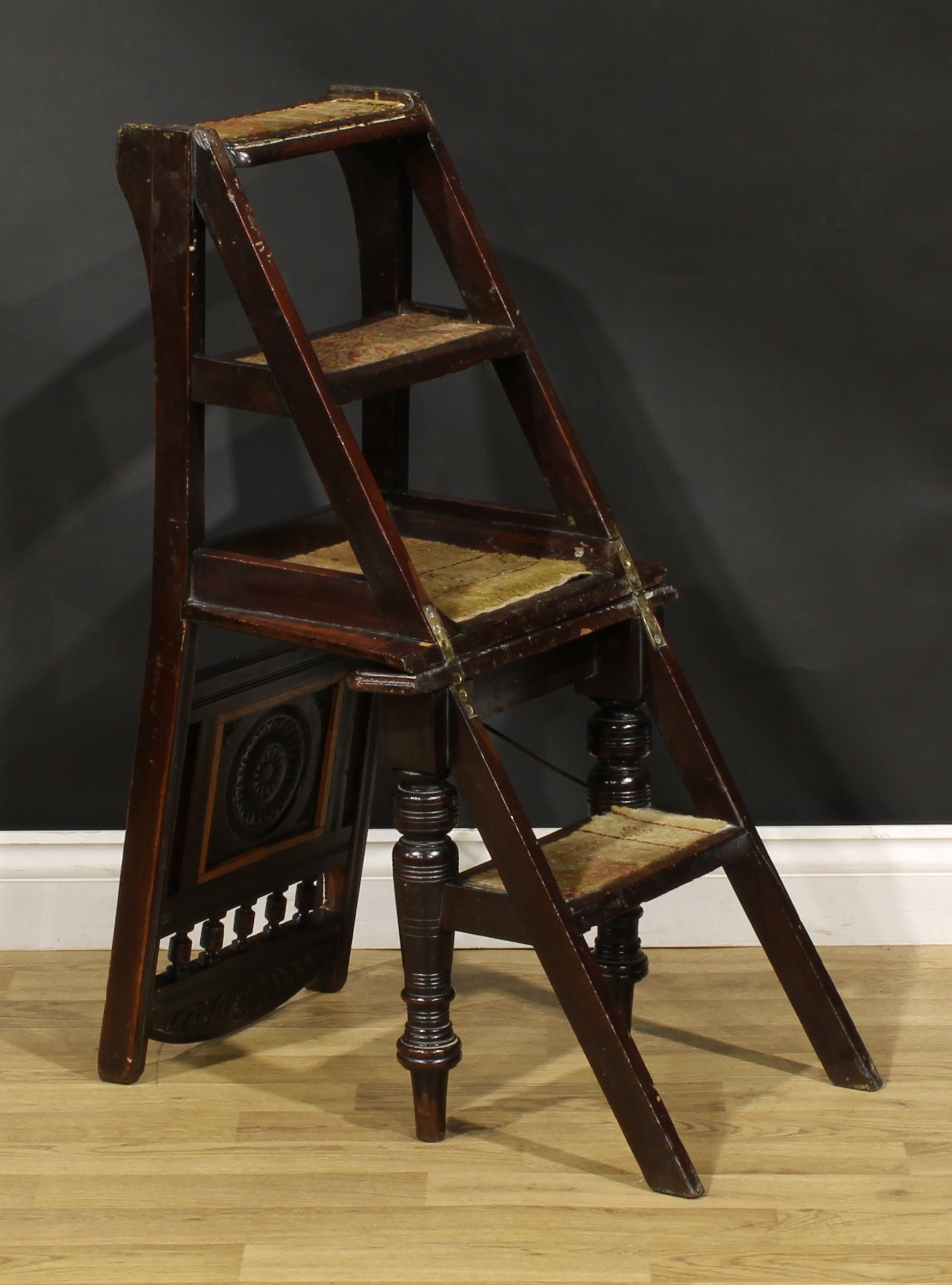 A late Victorian Aesthetic Movement metamorphic library step chair, spindle back with carved central - Image 6 of 6