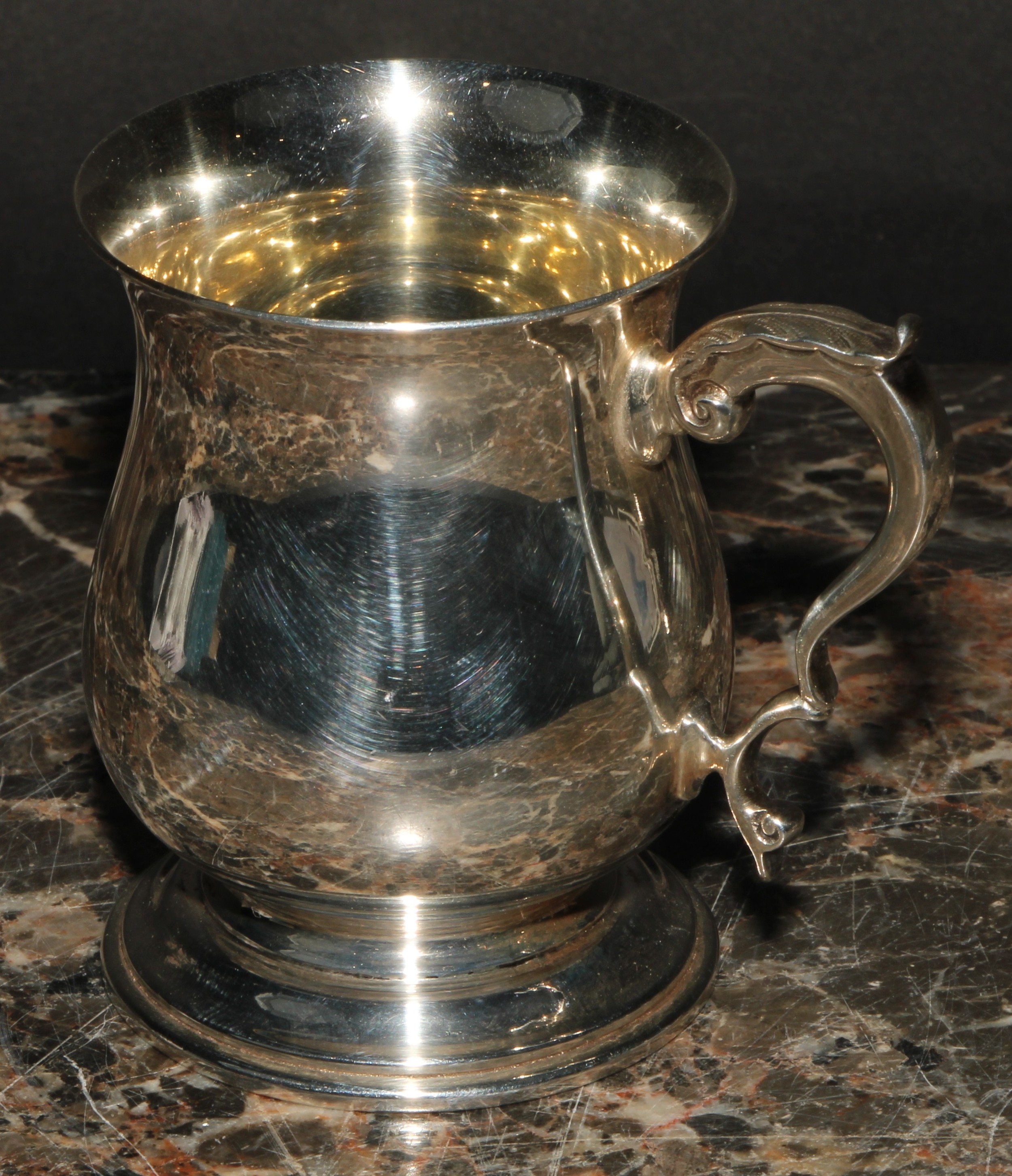 An Elizabeth II silver bell shaped mug, of George II design, quite plain, acanthus-capped double - Image 3 of 4