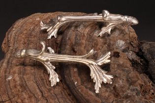 A pair of William IV silver novelty knife rests, cast as leafy branches, 9.5cm long, London 1836