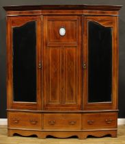 A Sheraton Revival rosewood crossbanded mahogany wardrobe, moulded cornice above a central panel