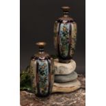 A pair of Japanese cloisonne enamel lobed ovoid vases, painted in polychrome with flowers within