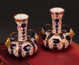 A pair of Royal Crown Derby Imari pattern compressed globular vases, long flared neck with two