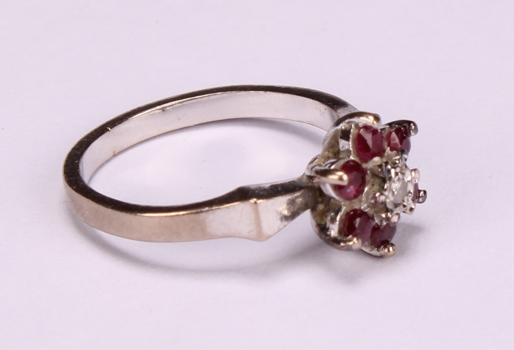 A diamond and sapphire square set cluster ring, the central cushion cut stone within a border of - Image 6 of 8