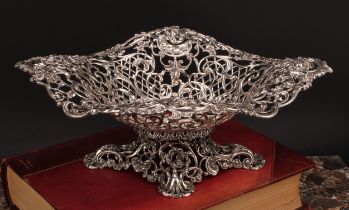 A Victorian cast silver table centre pedestal dish, pierced and modelled with a with flowers,