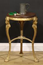 A Victorian cast iron public house table, circular top, the serpentine legs with masks and lion