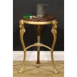 A Victorian cast iron public house table, circular top, the serpentine legs with masks and lion