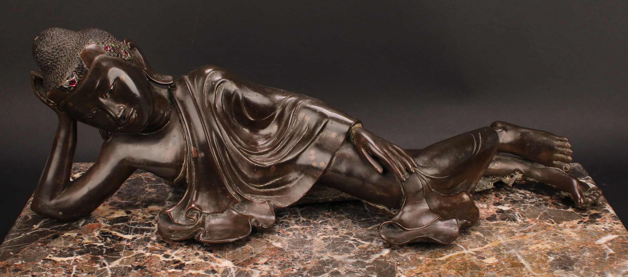 Chinese School, a brown patinated bronze, Buddha, depicted reclining, about to enter Parinirvana, - Image 2 of 4