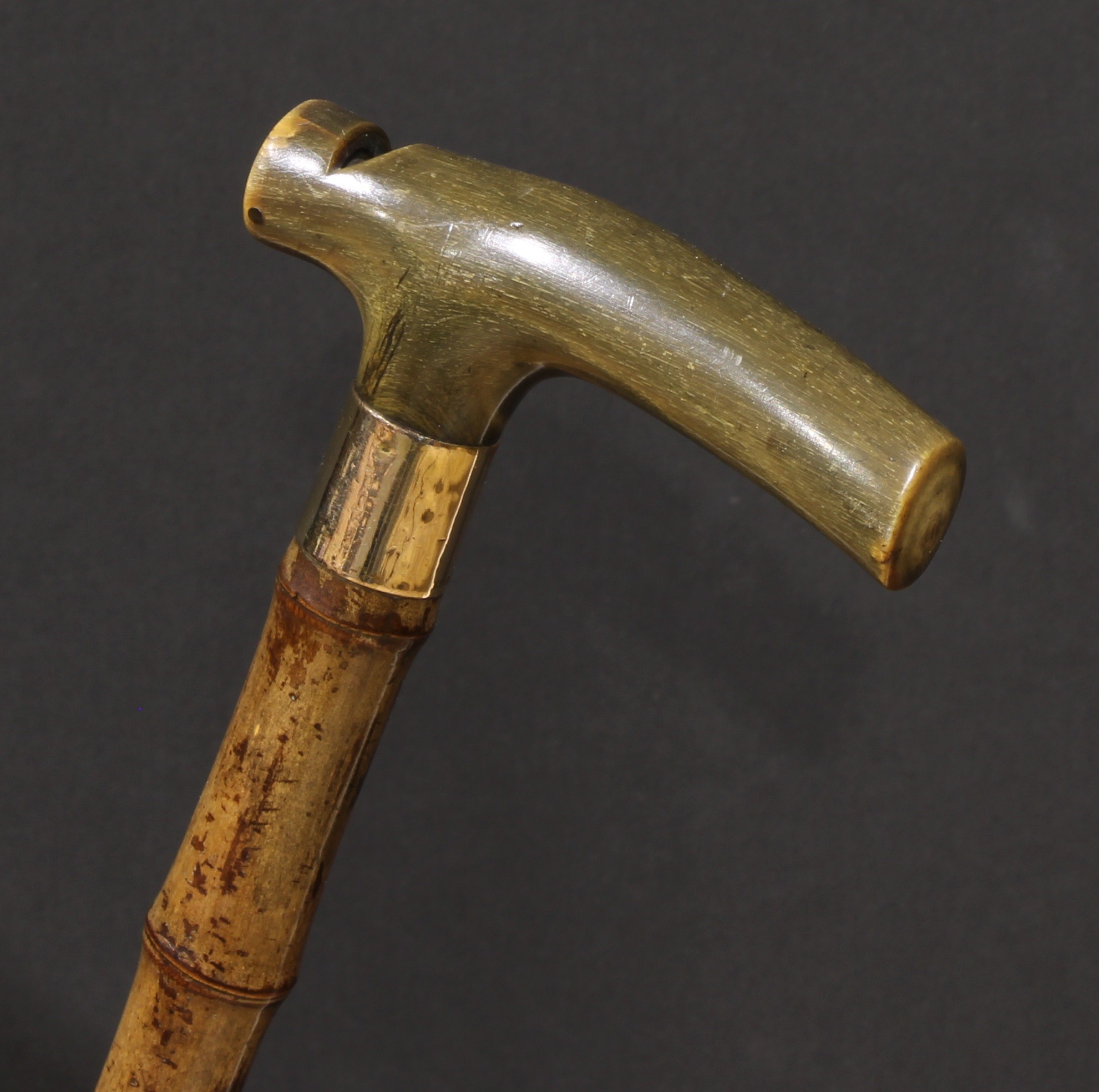 An early 20th century novelty walking stick, by Brigg, London, the L-shaped horn handle as a - Image 2 of 4