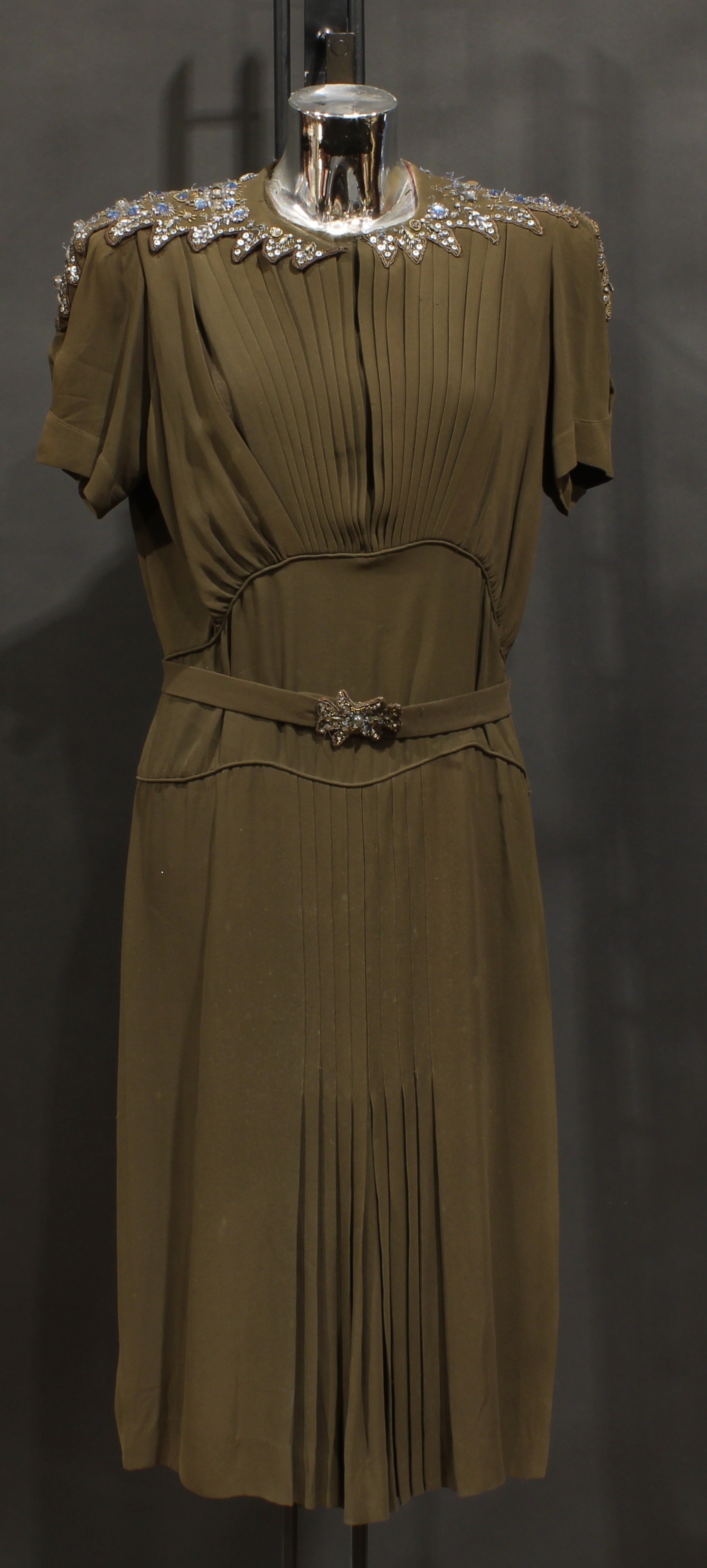 Vintage Fashion - A Norman Hartnell silk crepe dress, in khaki green/brown, the shaped collar