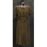 Vintage Fashion - A Norman Hartnell silk crepe dress, in khaki green/brown, the shaped collar