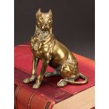 An early 20th century bronze novelty inkwell, as a dog, seated, his head hinged as the cover,