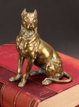 An early 20th century bronze novelty inkwell, as a dog, seated, his head hinged as the cover,