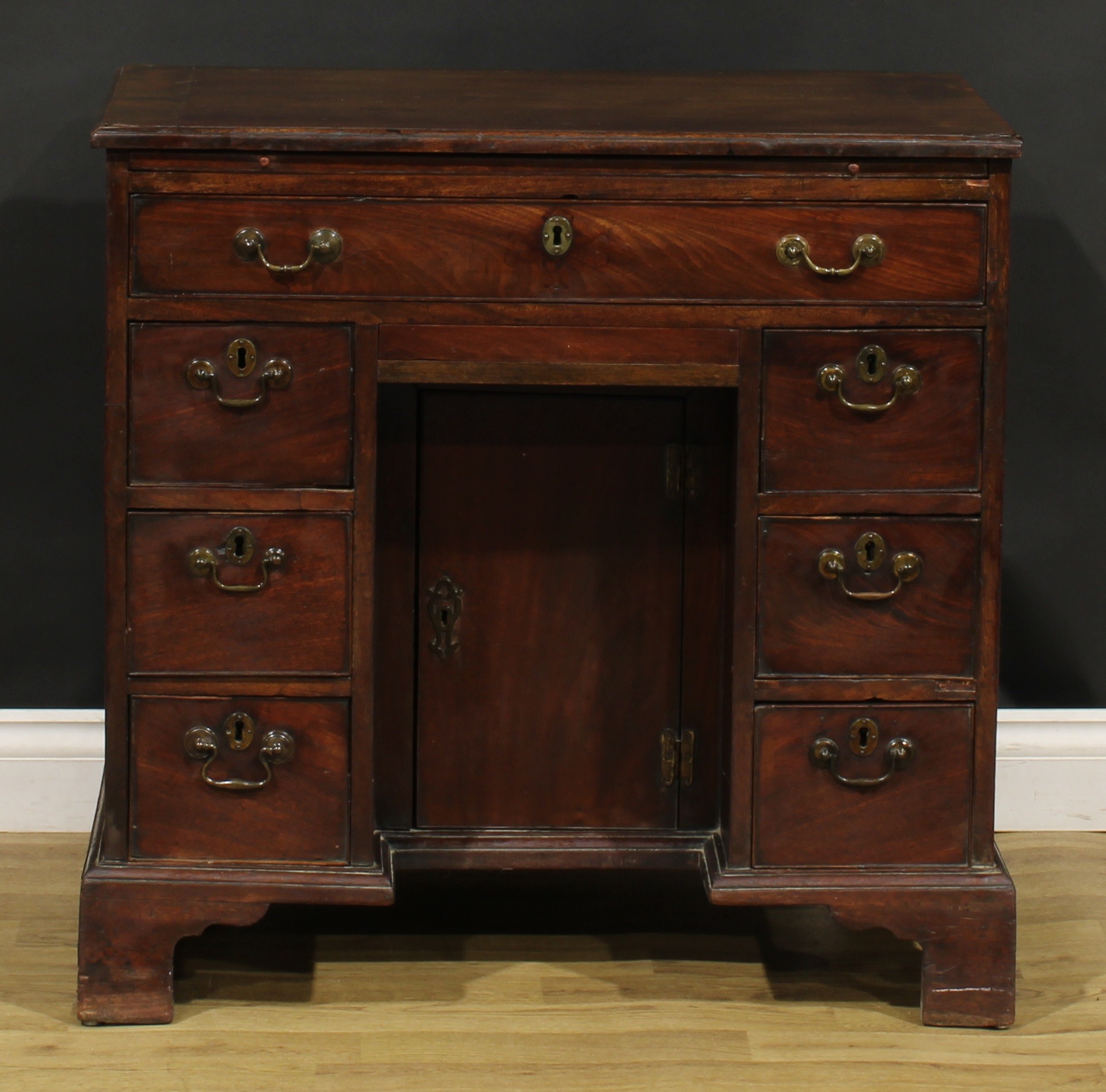 A George III mahogany kneehole desk, slightly oversailing top with moulded edge above a slide and - Image 2 of 8