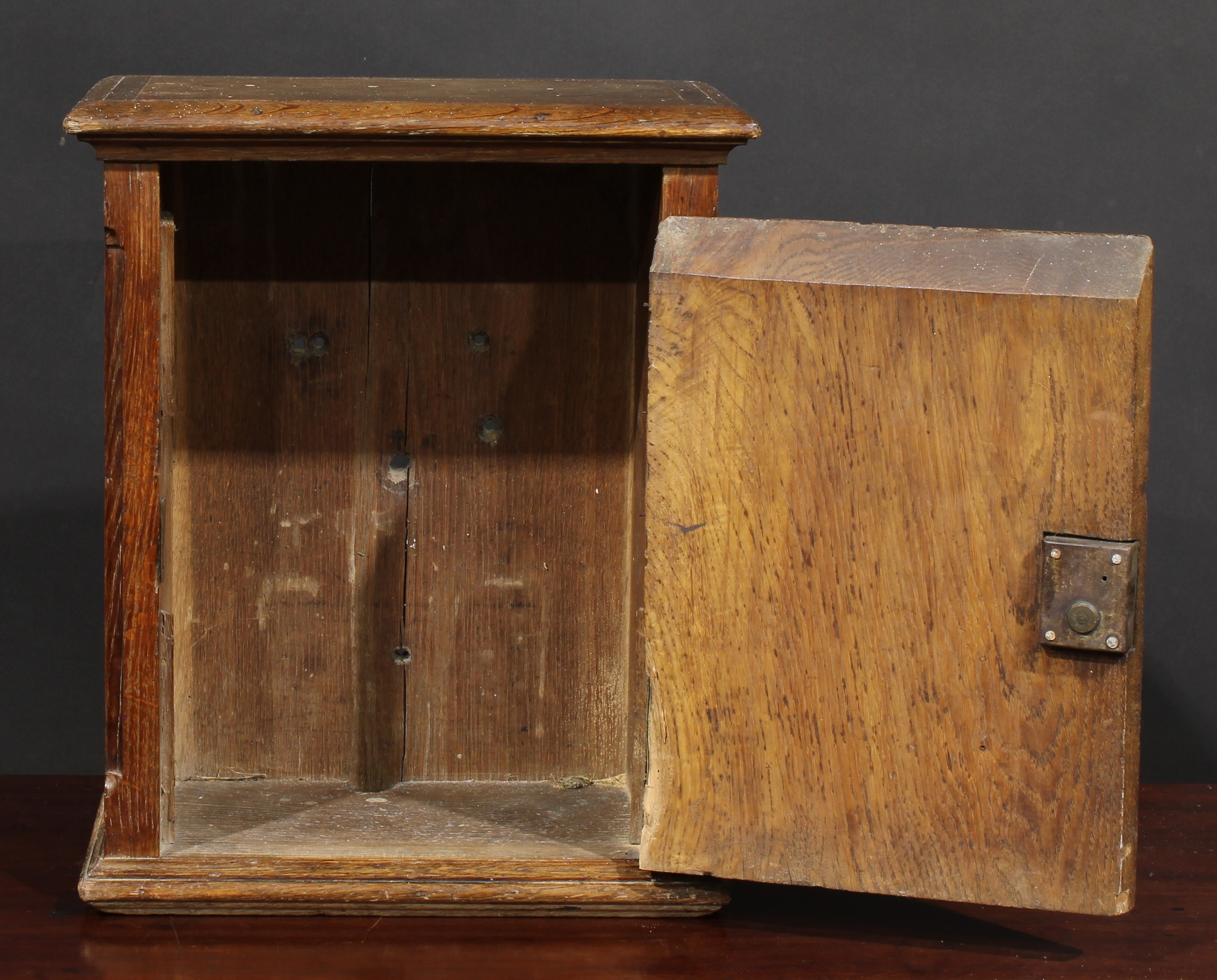 A 19th century French Provincial oak chateau post box, letter aperture above a rectangular door, - Image 2 of 3