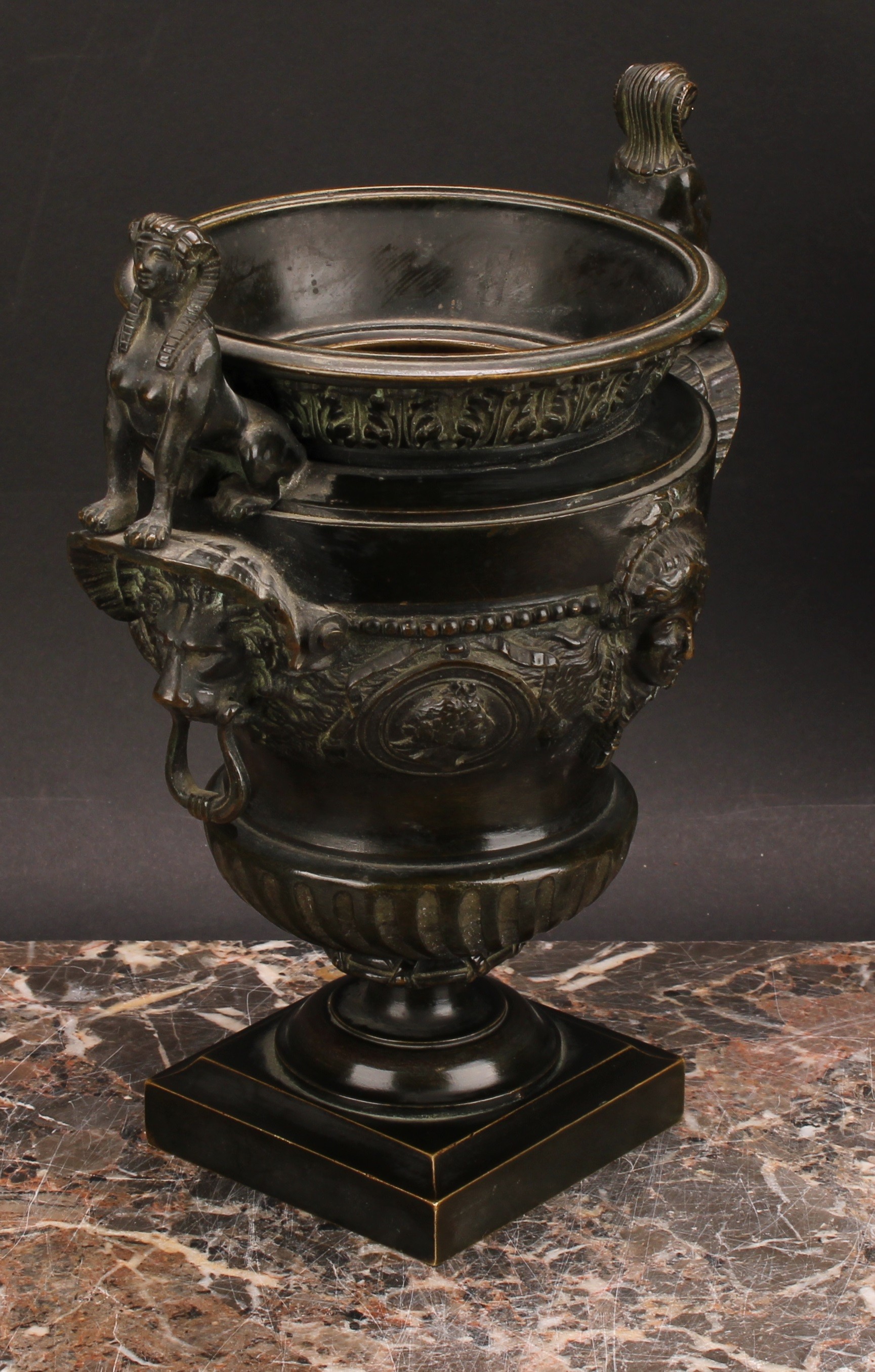 A pair of late 19th century dark patinated bronze urns, cast in the Classical and Egyptian Revival - Image 4 of 6