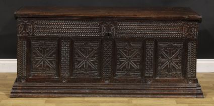 A late 17th century Flemish oak blanket chest, hinged top enclosing a till and ledge, the four-panel