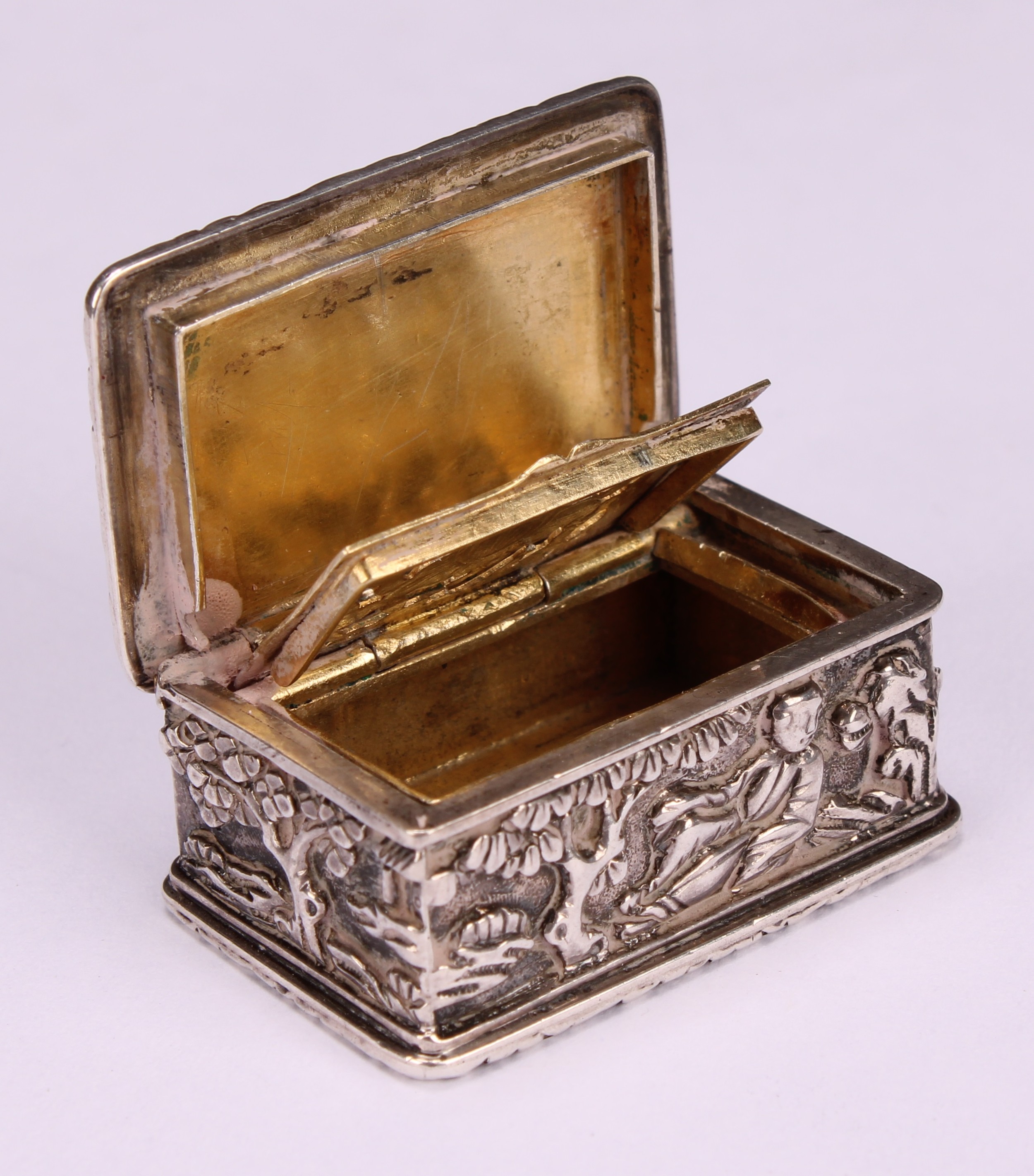 A Chinese silver rectangular vinaigrette, in relief with young boys in landscapes and riding a - Image 4 of 5