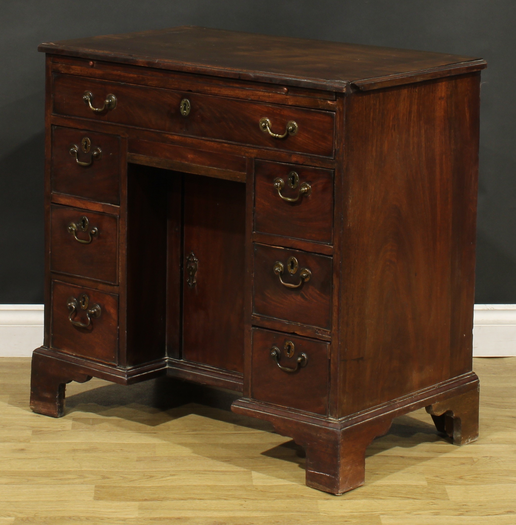 A George III mahogany kneehole desk, slightly oversailing top with moulded edge above a slide and - Image 7 of 8