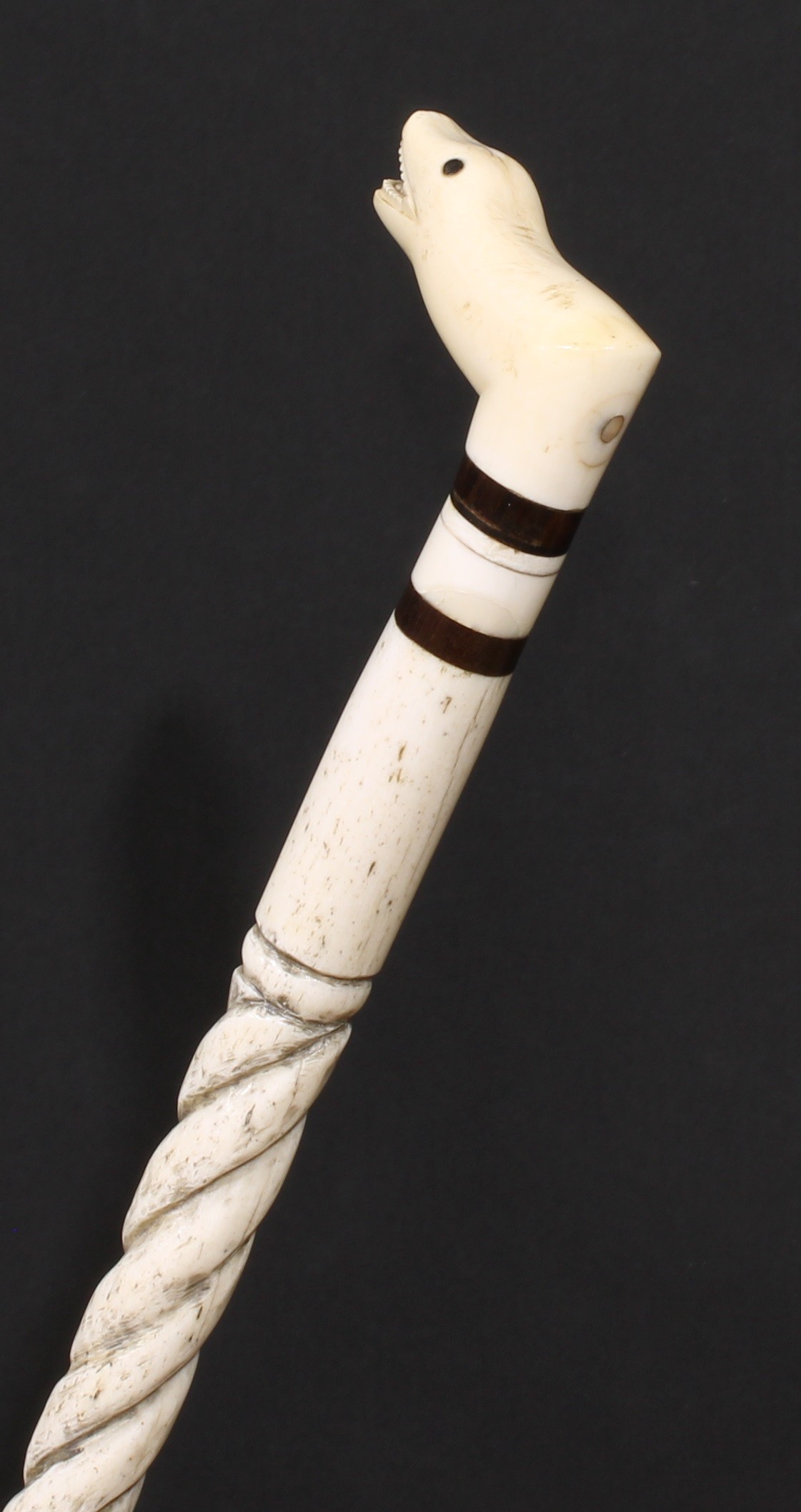 A 19th century sailor's maritime whale bone walking stick, the L-shaped handle as the head of a - Image 2 of 3