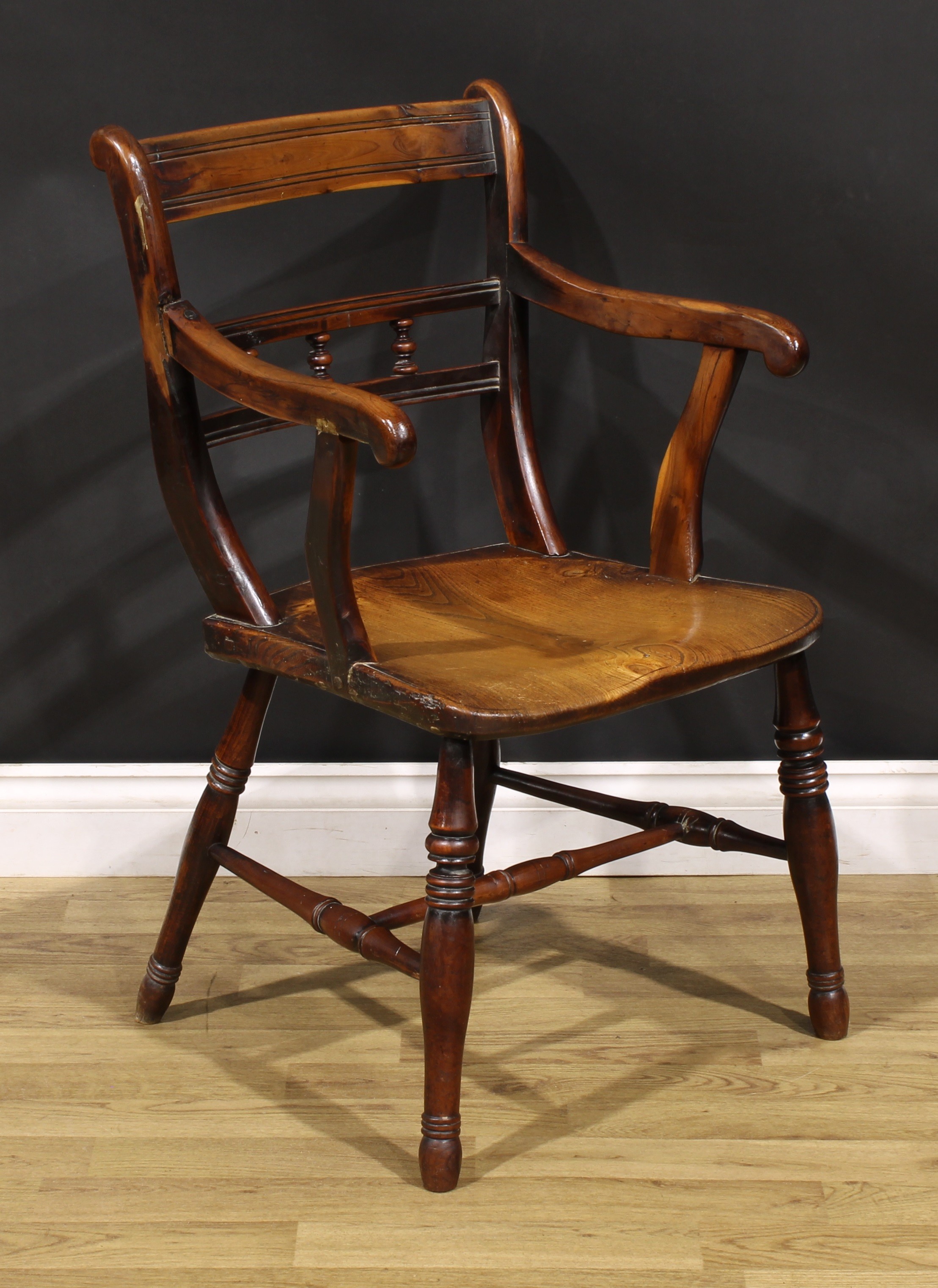 An early 19th century yew and elm elbow chair, saddle seat, turned legs, H-stretcher, 86cm high, - Image 2 of 4