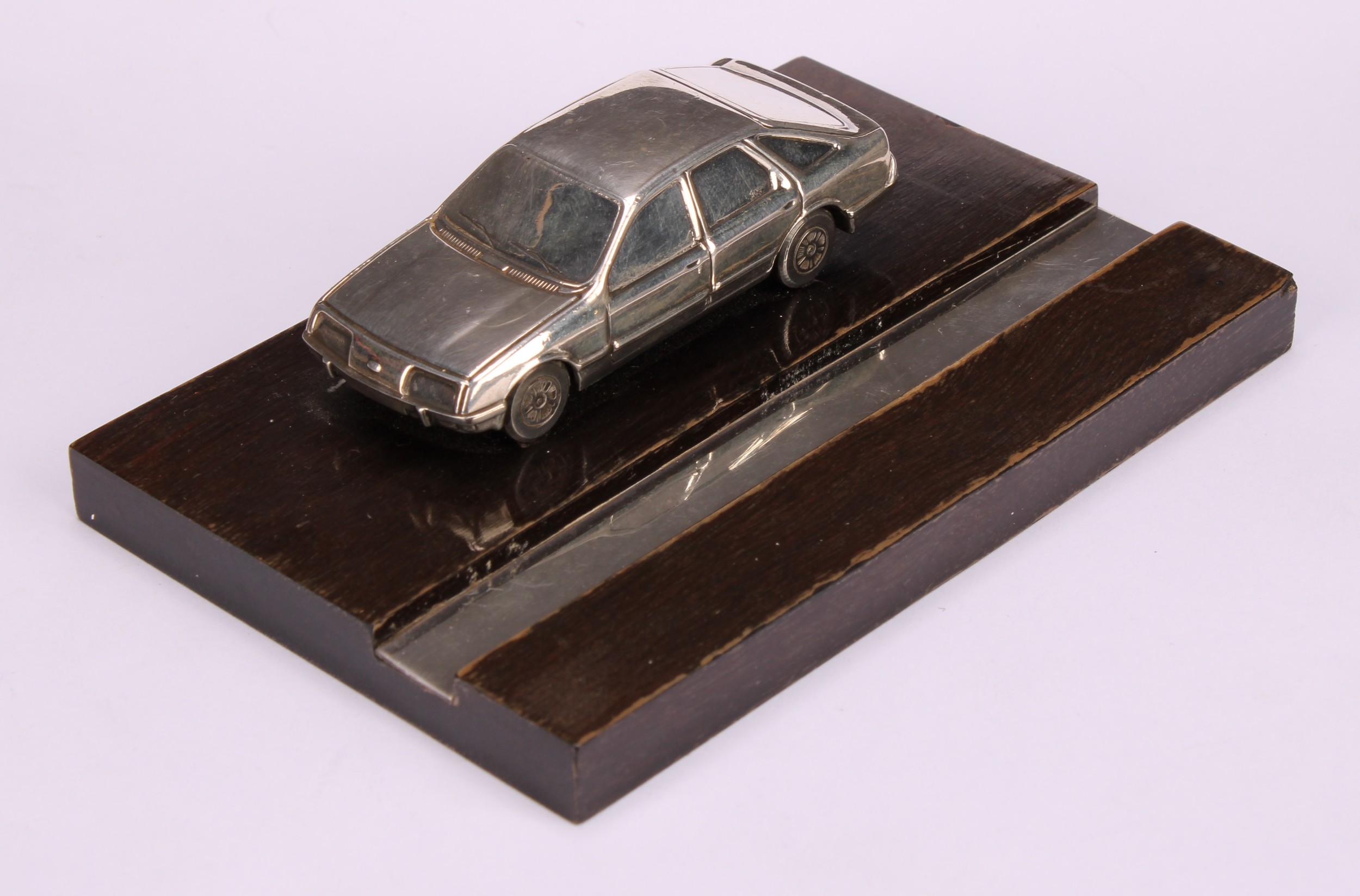 Automobilia - an Elizabeth II silver mounted desk stand, applied with a cast model of a Ford Sierra, - Image 3 of 4