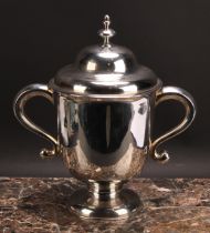 A large George II Irish silver bell shaped loving cup and cover, quite plain and of substantial