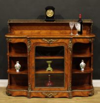 A Victorian gilt metal mounted walnut credenza or side cabinet, slightly oversailing top with