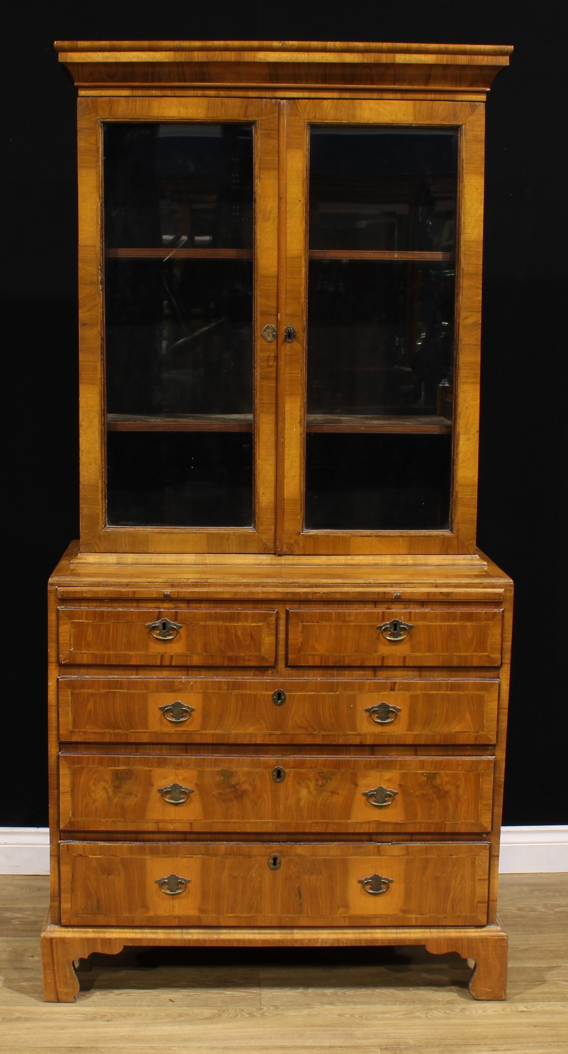 An 18th century and later walnut library bookcase, outswept cornice above a pair of glazed doors, - Image 3 of 3