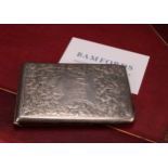 A Victorian silver rectangular aide memoir, sprung-hinged cover enclosing provision for a note