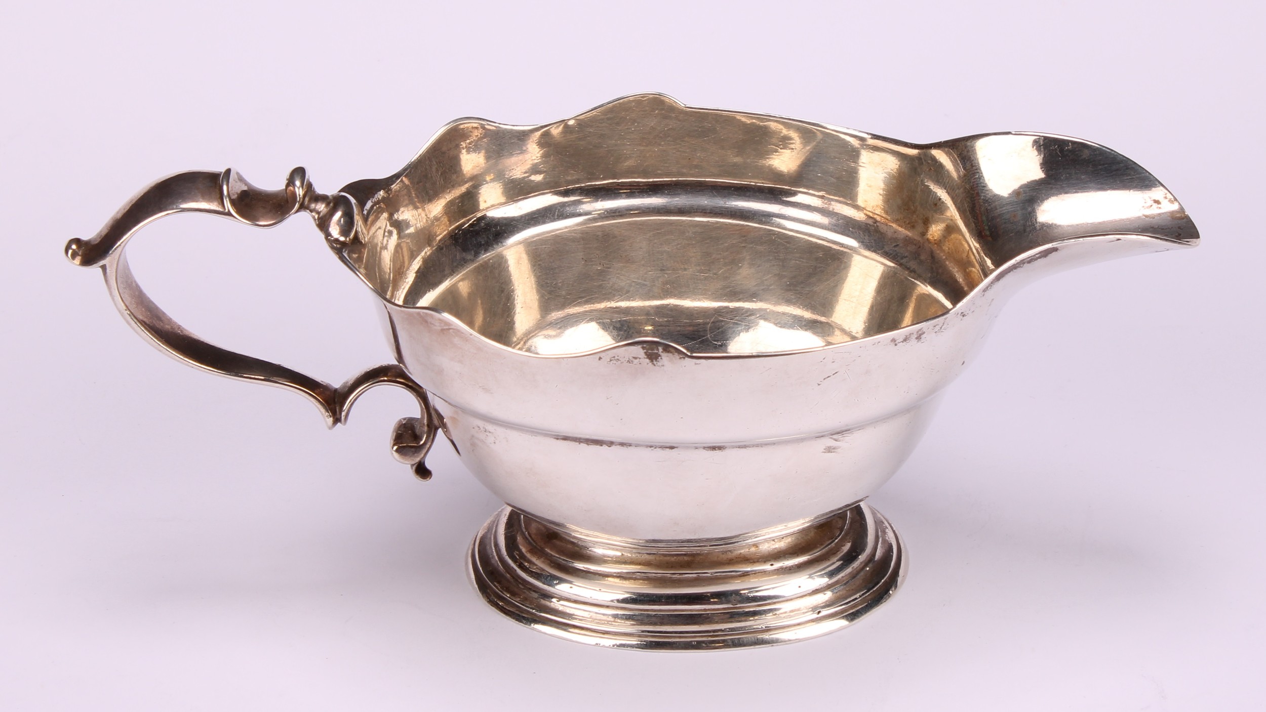 A pair of early George II silver sauce boats, wavy borders, scroll handles, cast bases, 19.5cm long, - Image 6 of 8