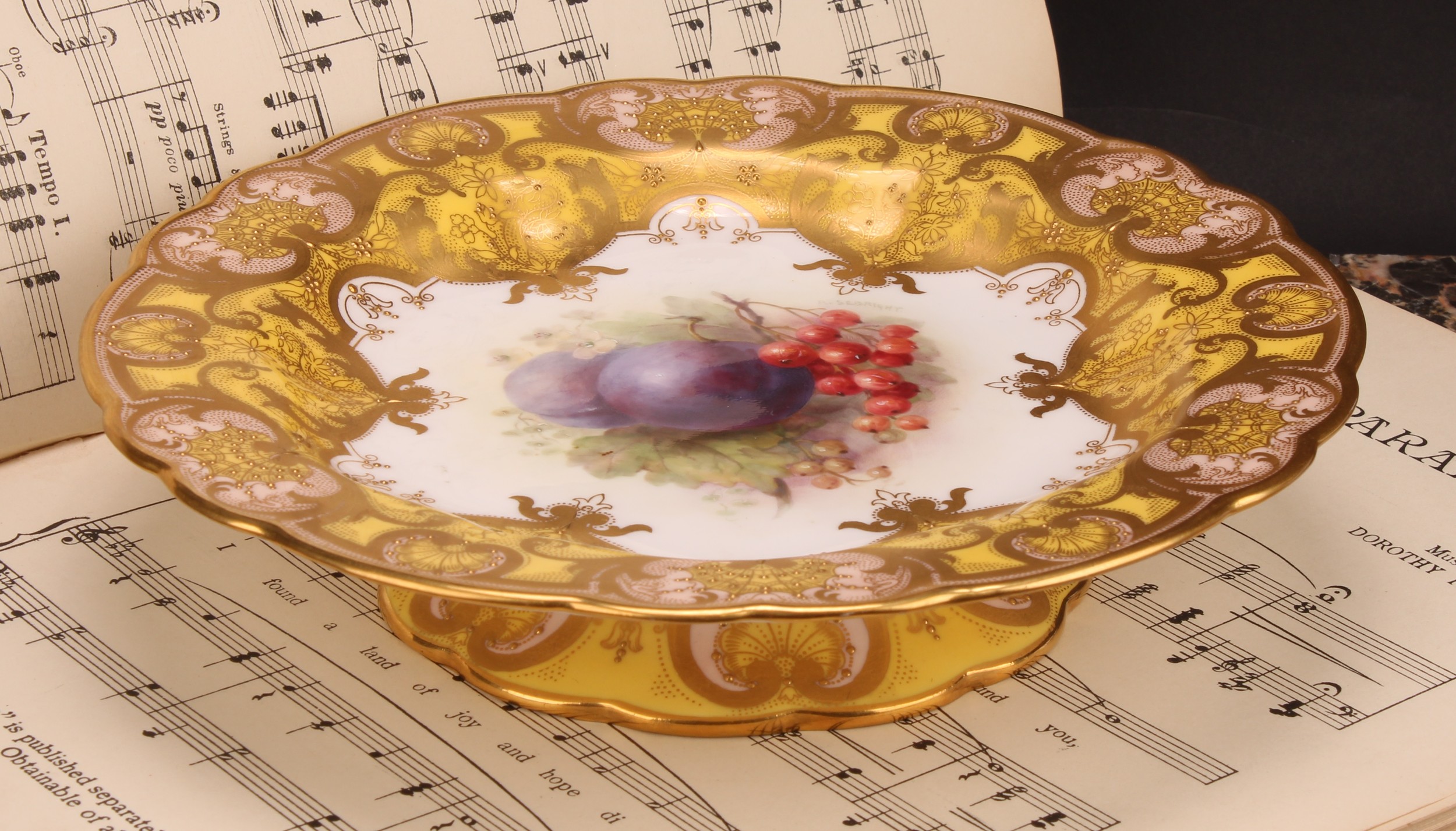 A Royal Worcester shaped pedestal low comport, painted by Richard Sebright, signed, with ripening