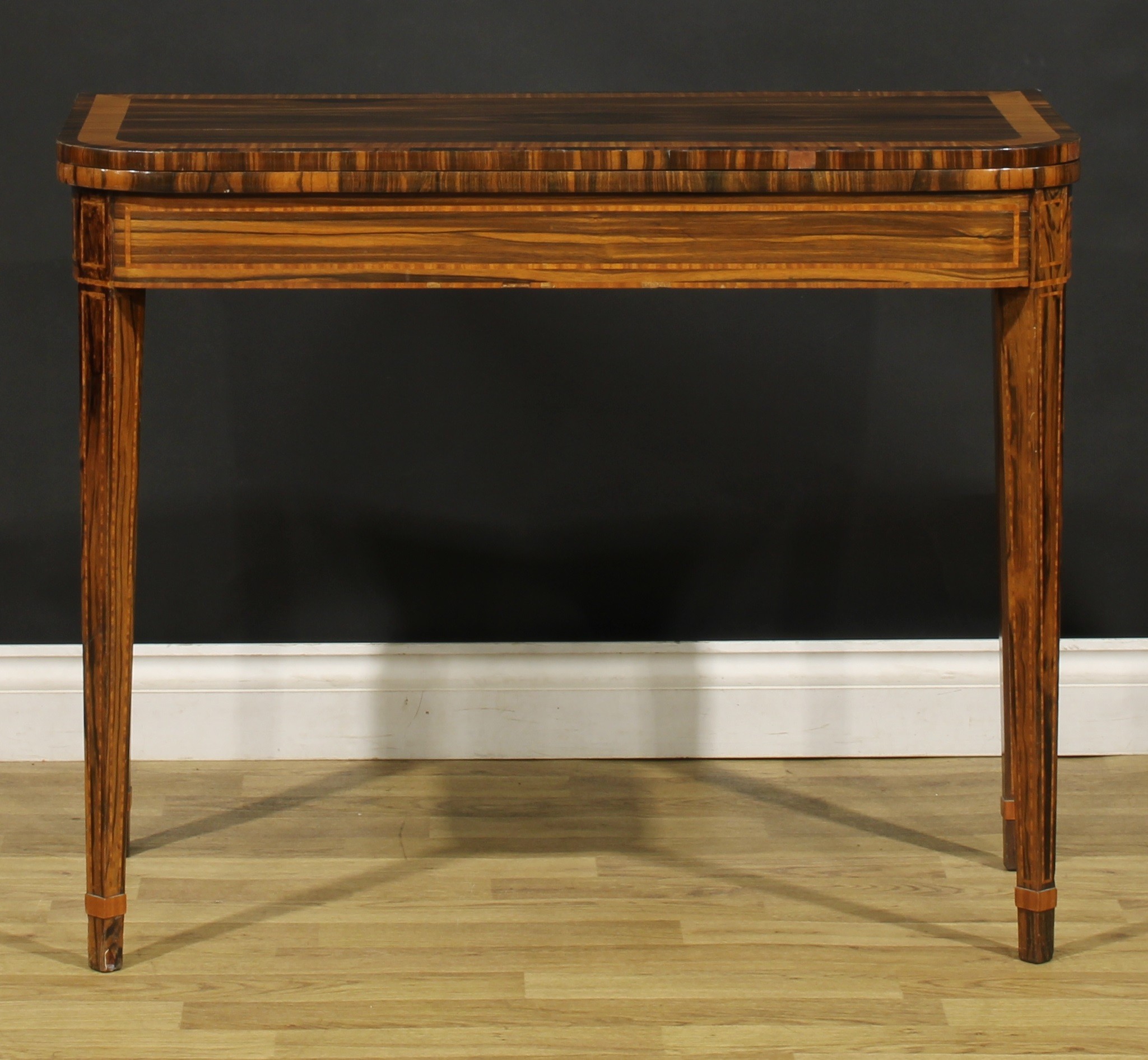 A George III satinwood crossbanded coromandel card table, hinged top enclosing a baize lined playing - Image 2 of 6