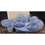 A Wedgwood jasperware cabaret set, comprising teapot, milk jug, sucrier and cover, two cups and