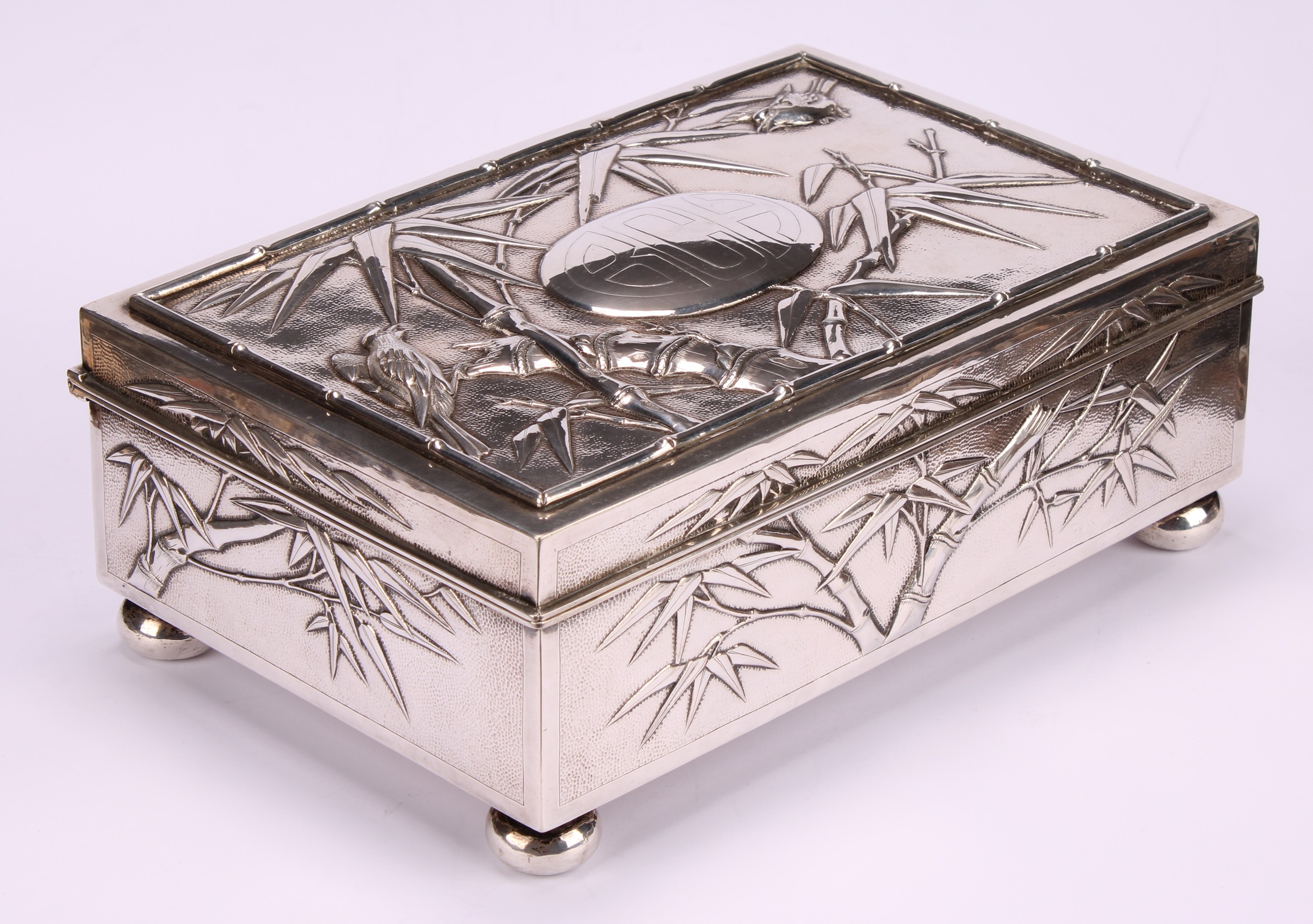 A large Chinese silver rectangular cigar box, chased with birds amongst leafy bamboo, hinged - Image 3 of 5