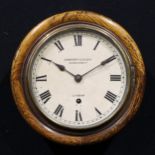 A mid 20th century oak railway or school wall timepiece, 19cm circular clock dial inscribed