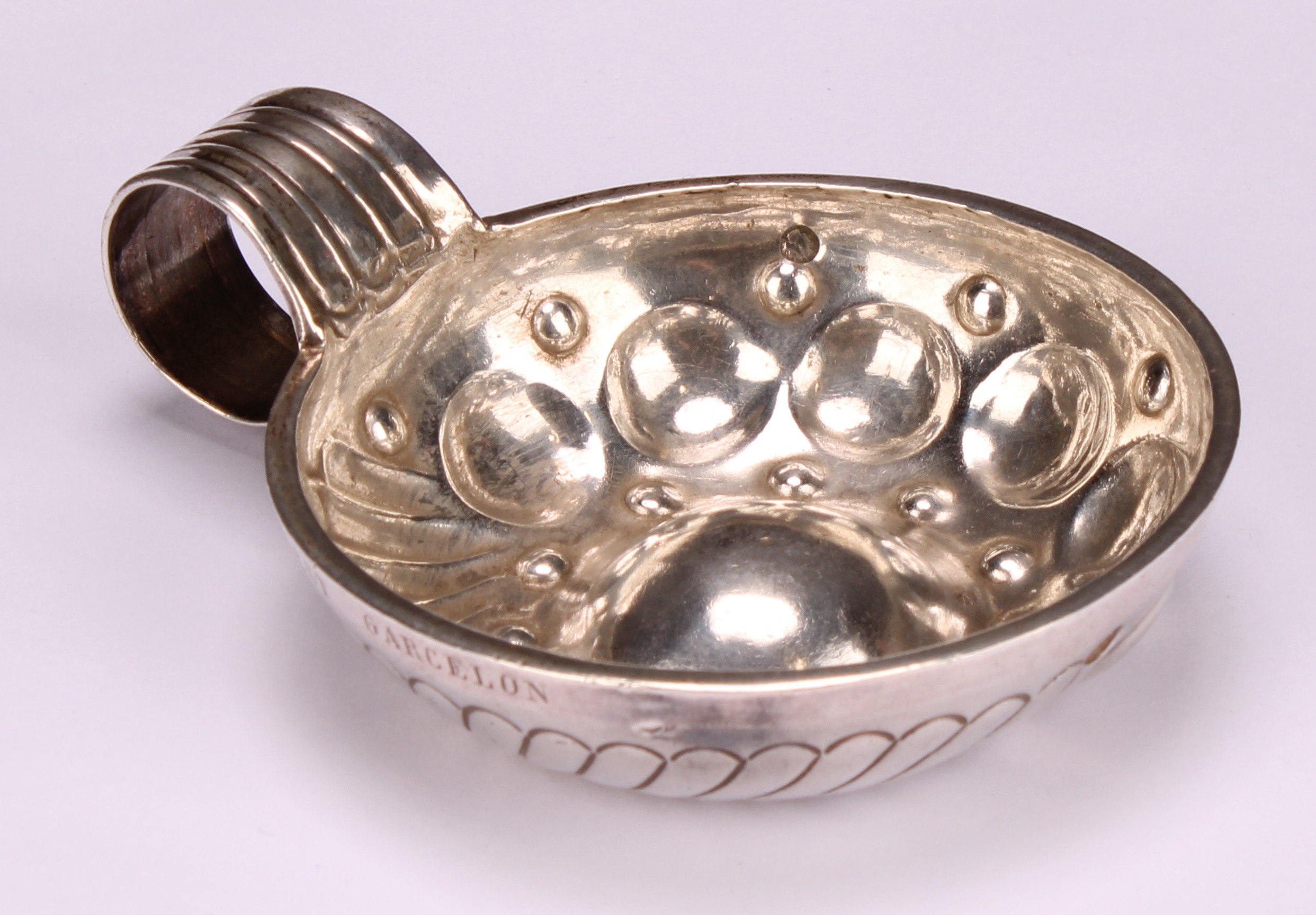 A French silver wine taster, fluted and chased, loop handle, inscribed Ernest Garcelon, 7cm diam, - Image 3 of 4