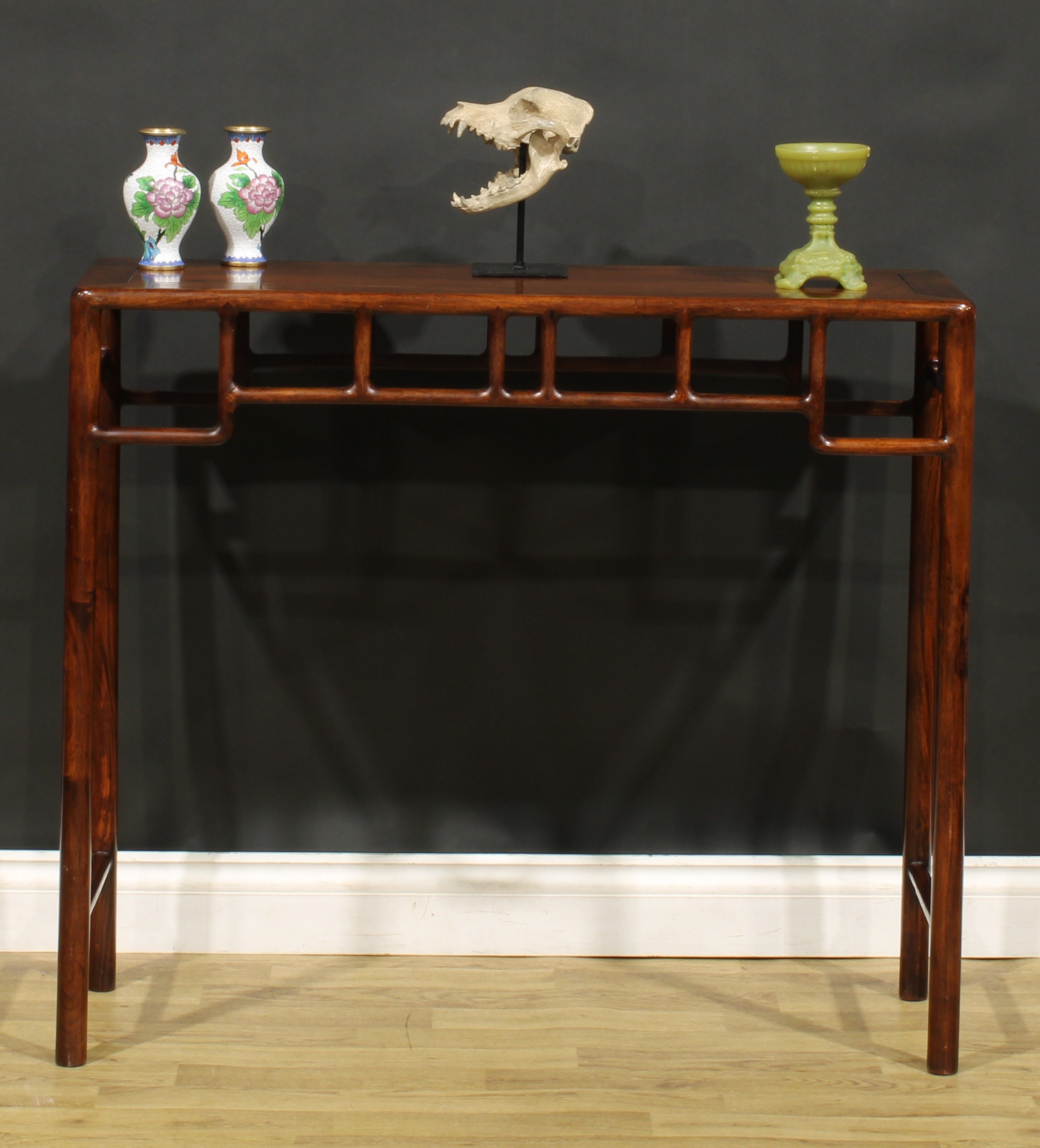 A Chinese hardwood side or altar table, of domestic proportions, rectangular top above a deep