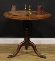 A George III oak tripod occasional table, circular tilting top, turned column, cabriole legs, pad