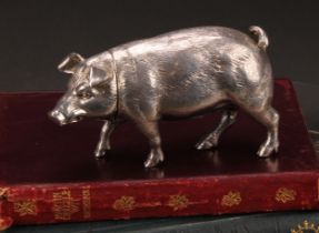 An early 20th century cast silver novelty cannister, as a pig, push-fitting cover, 11cm long, import