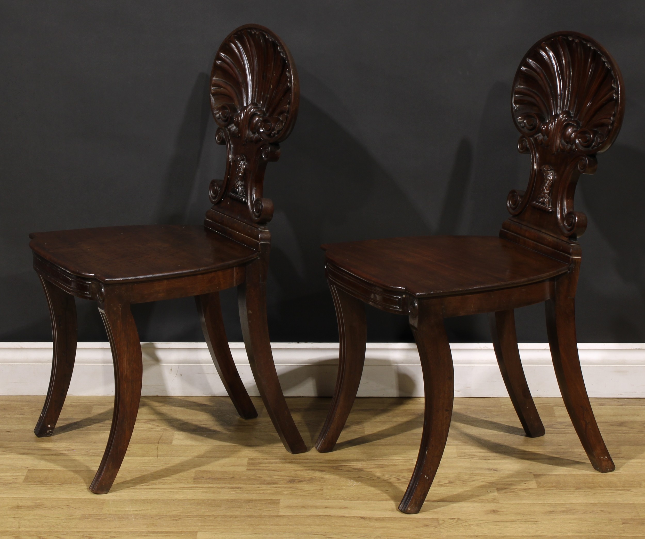A pair of Post-Regency mahogany hall chairs, in the manner of Gillows of Lancaster and London, - Image 3 of 4