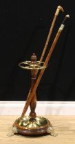 A 19th century design walnut and brass-mounted walking stick stand, turned baluster and finial,