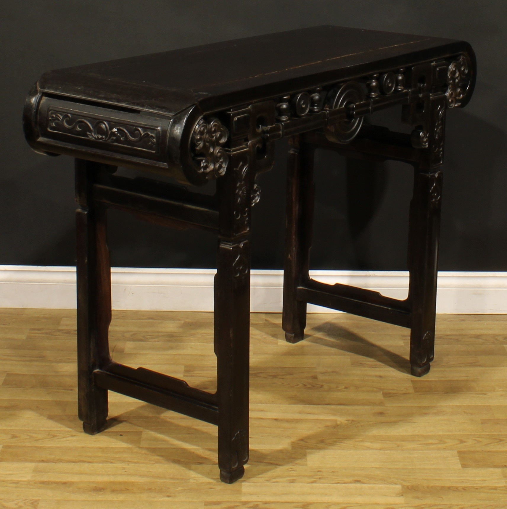 A Chinese hardwood altar table, rectangular top with scroll ends carved with ruyi heads, shaped - Image 3 of 3