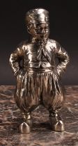 A German cast silver novelty pepper, as a young Dutch boy, he stands, with hands in pockets, 12.