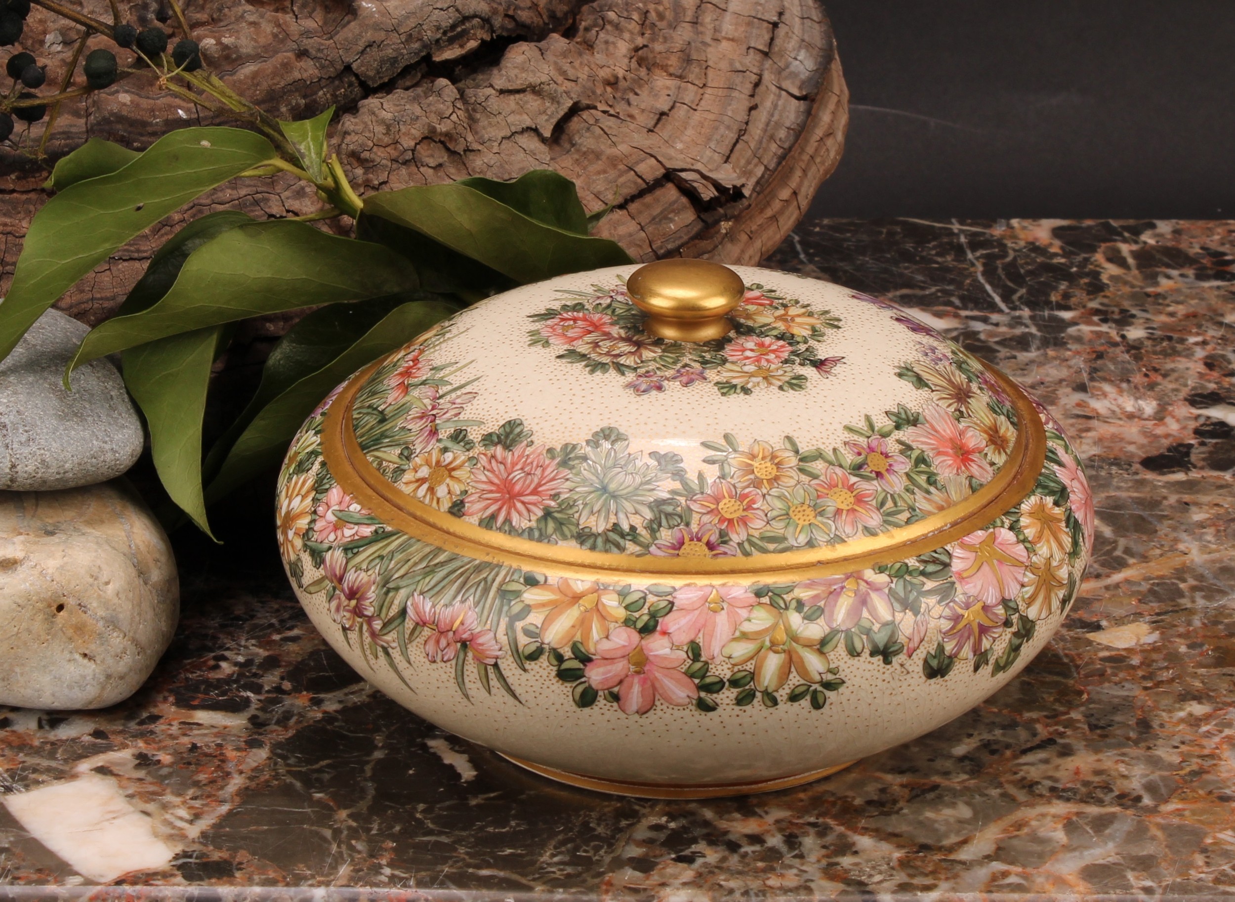 A Japanese satsuma bun shaped bowl and cover, painted in the typical palette with flowers, 15.5m