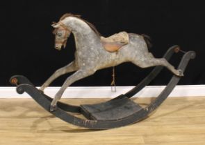 A Victorian rocking horse, sleigh base, 168cm long Provenance: reputedly removed from Friargate